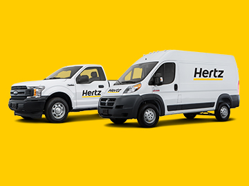 White cargo van and truck with a Hertz logo with a yellow background.
