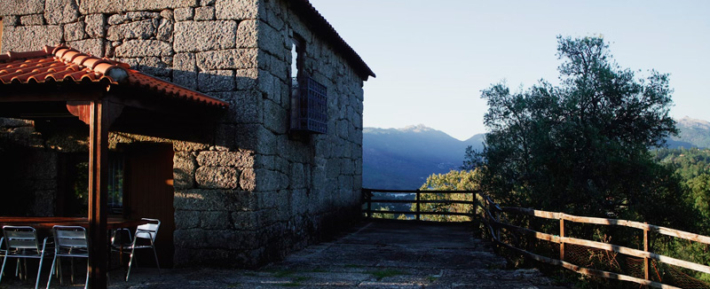 Stone house surrounded by nature, typical of rural Portuguese villages