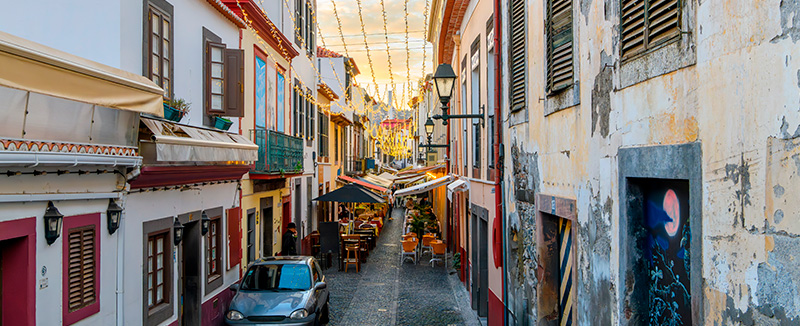 Rua de Santa Maria in Funchal, Madeira, known for its painted doors and artistic atmosphere.